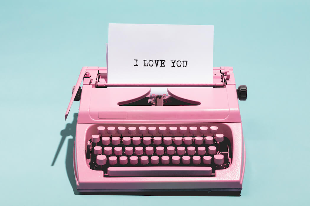 Valentinstag Sprüche auf rosa Screibmaschine